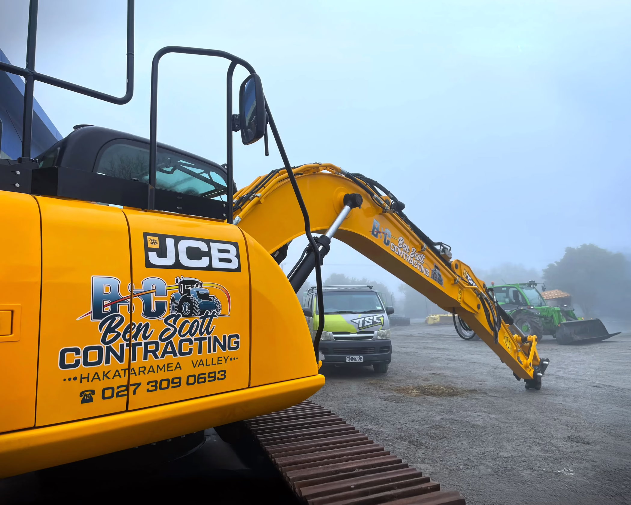Ben Scott Contracting JCB digger and TSS service vehicle with custom vinyl branding and logos in Hakataramea Valley, Timaru.