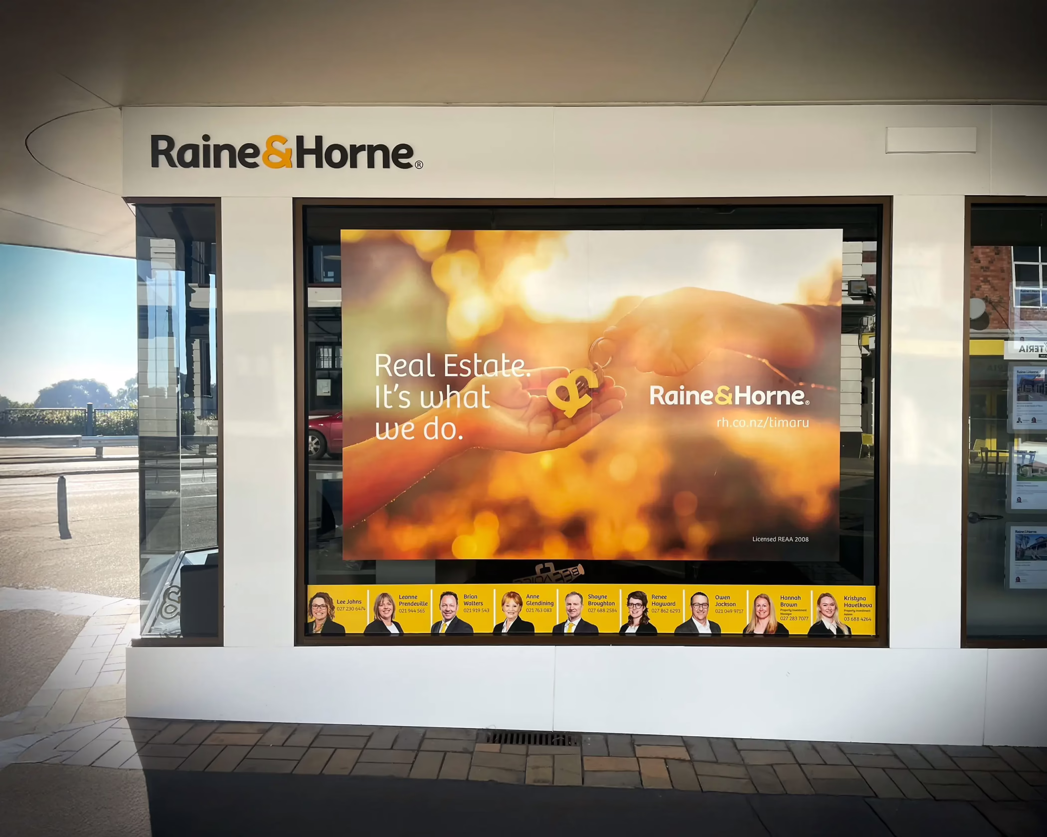 Window graphics for Raine & Horne real estate in Timaru by Timaru Signs Graphix.