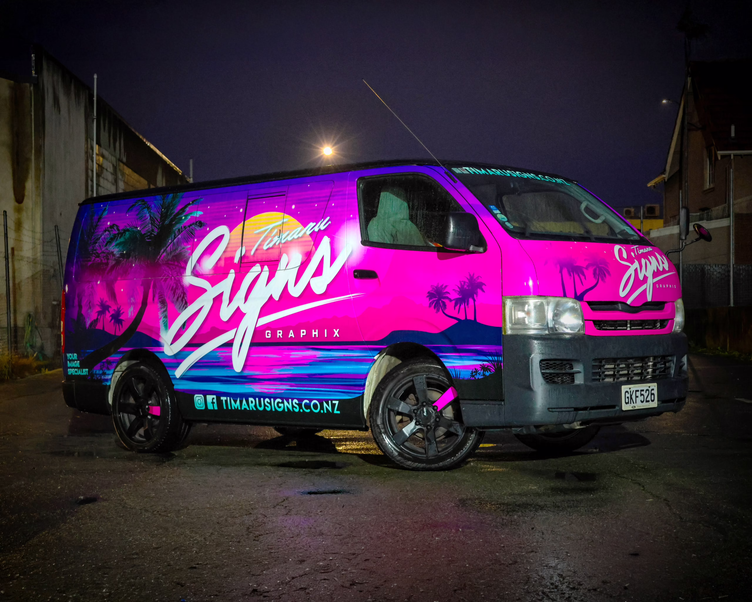 Full commercial vehicle wrap with vibrant reflective neon synthwave graphics on a van by Timaru Signs Graphix.