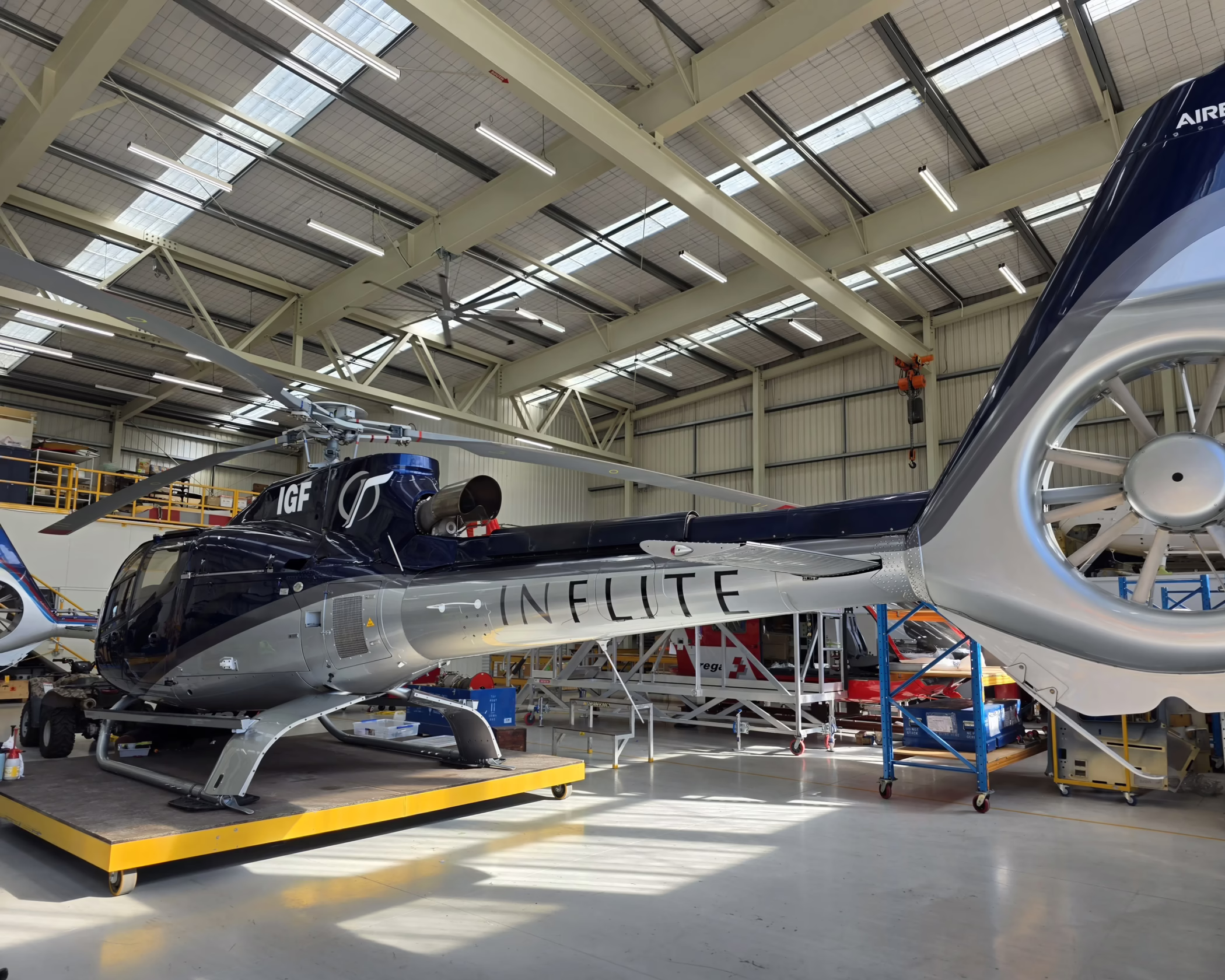 Custom dark blue and silver INFLITE helicopter vehicle wrap graphics by Timaru Signs Graphix.