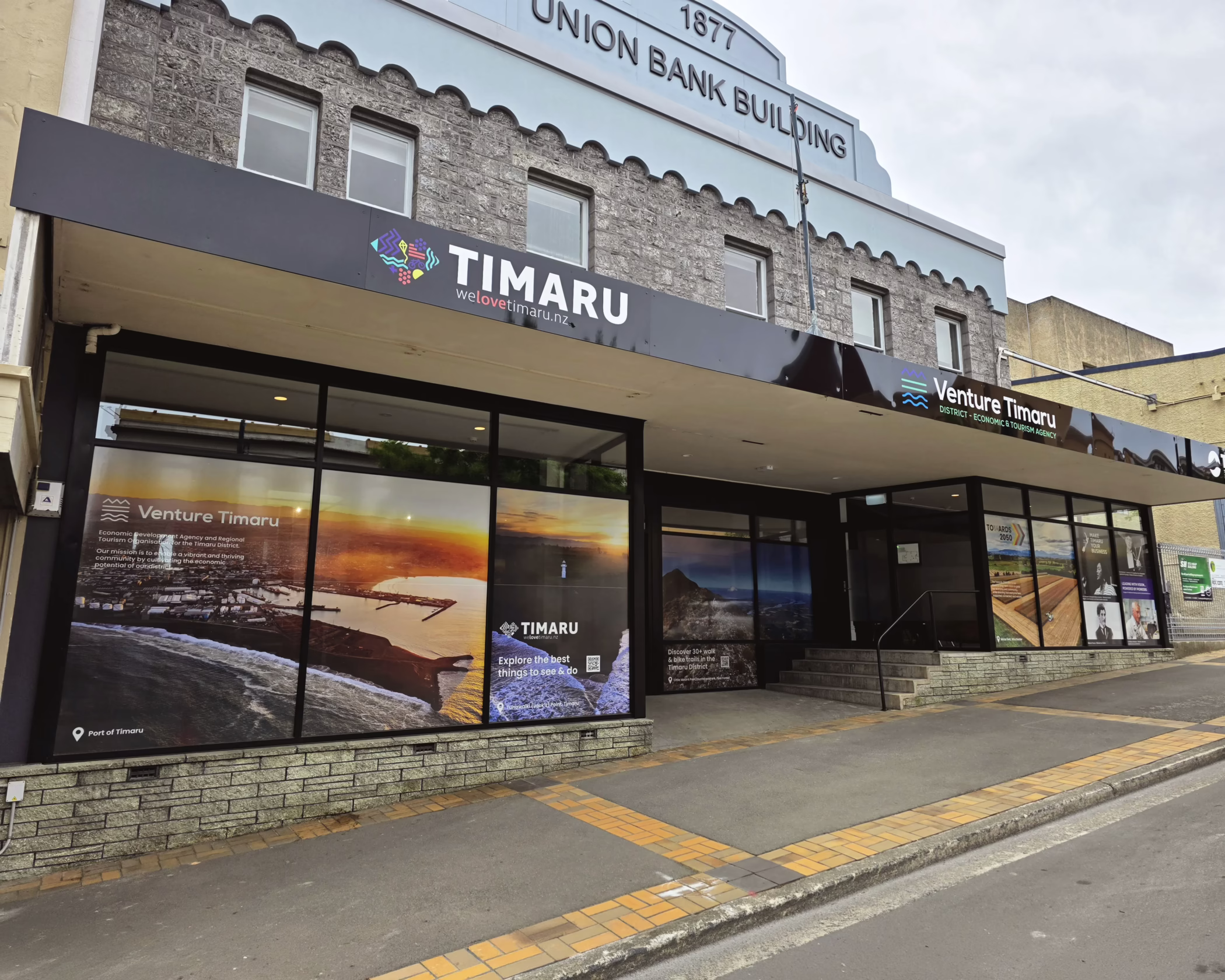 Venture Timaru building fascia sign and window graphics, custom designed for the historic Union Bank building.