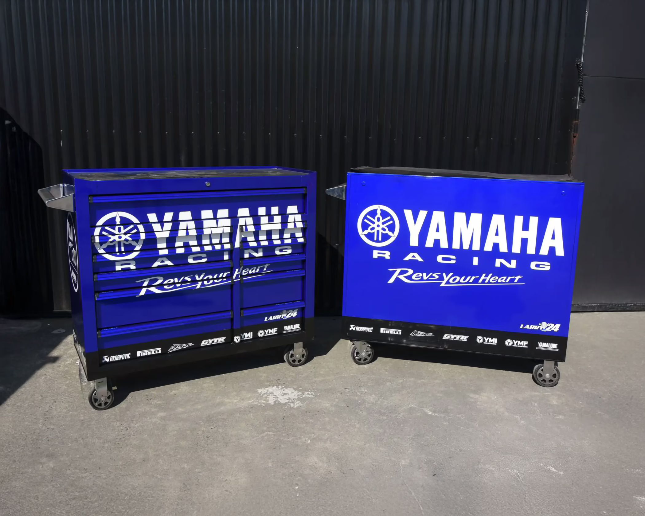 Custom motorsports graphics for blue Yamaha Racing pit trollies.