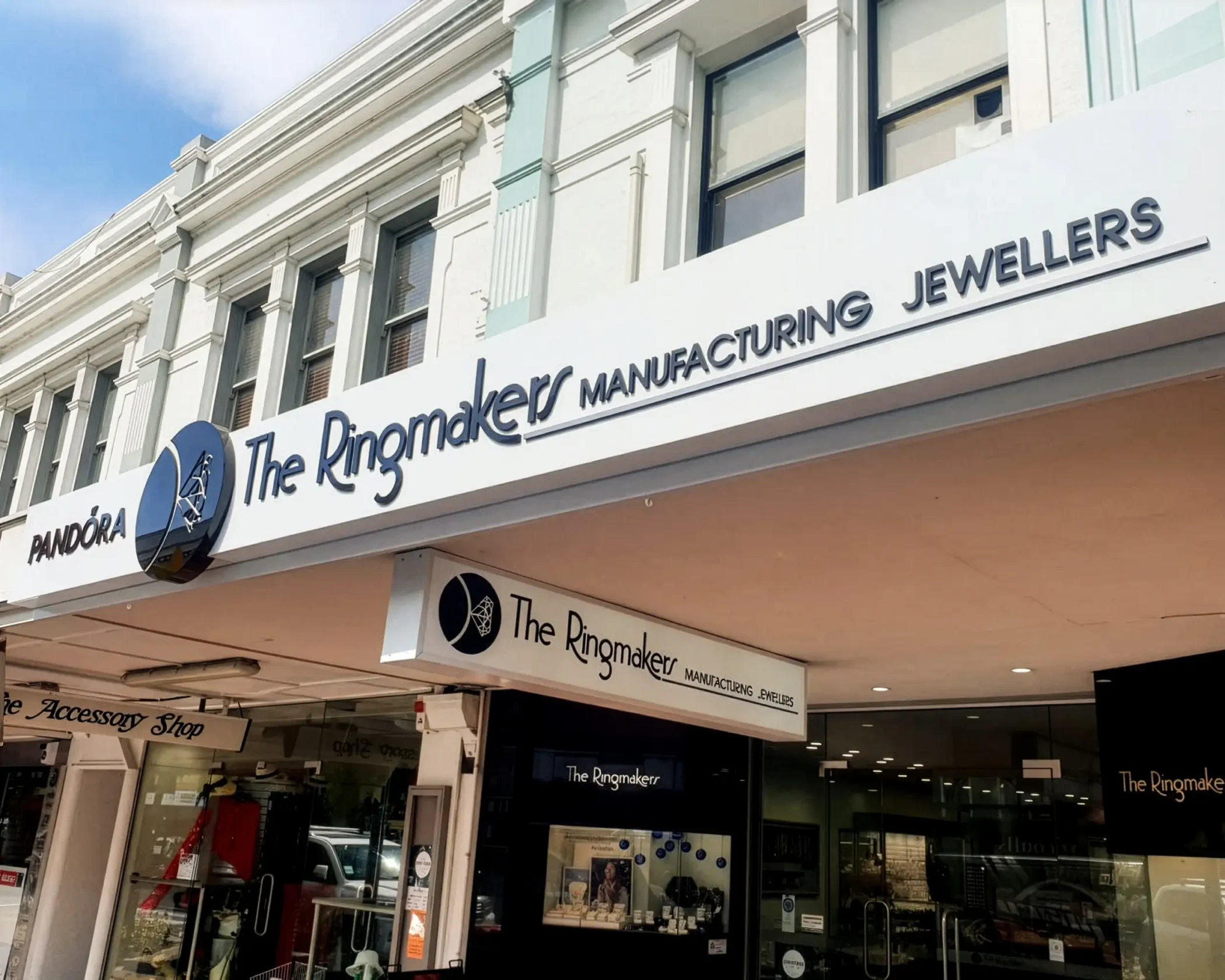 Storefront of "The Ringmakers Manufacturing Jewellers" featuring prominent 3D exterior signage and an under-canopy lightbox sign.