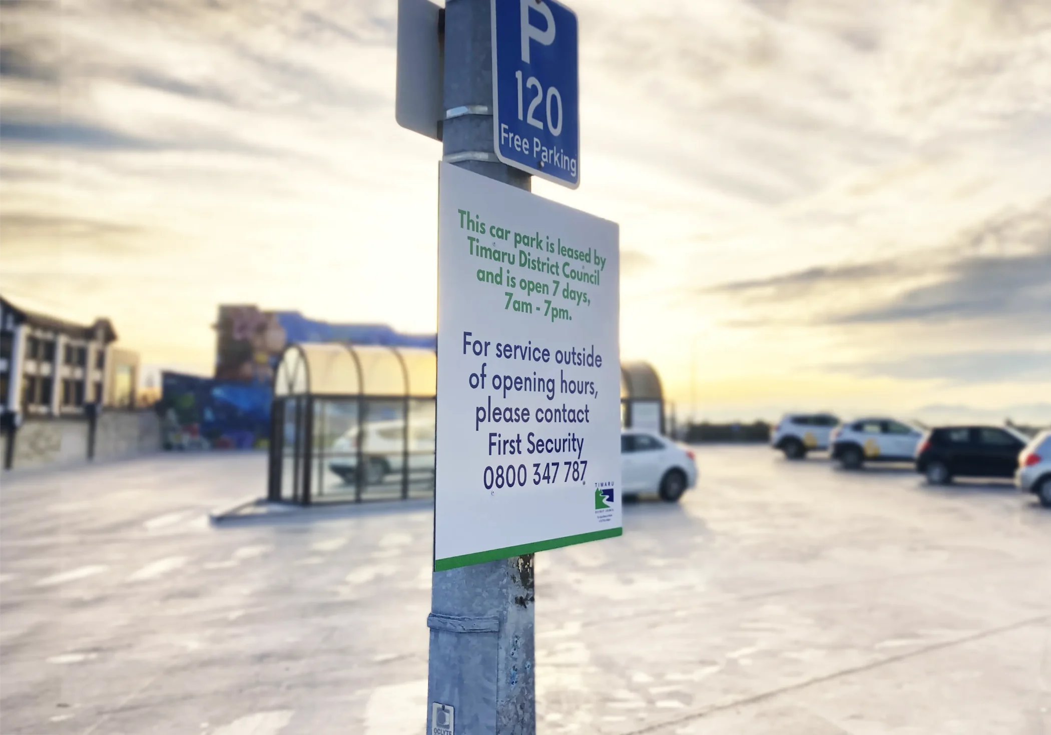 A parking sign for a Timaru District Council car park indicating 120 minutes of free parking and operating hours from 7am to 7pm, 7 days a week.